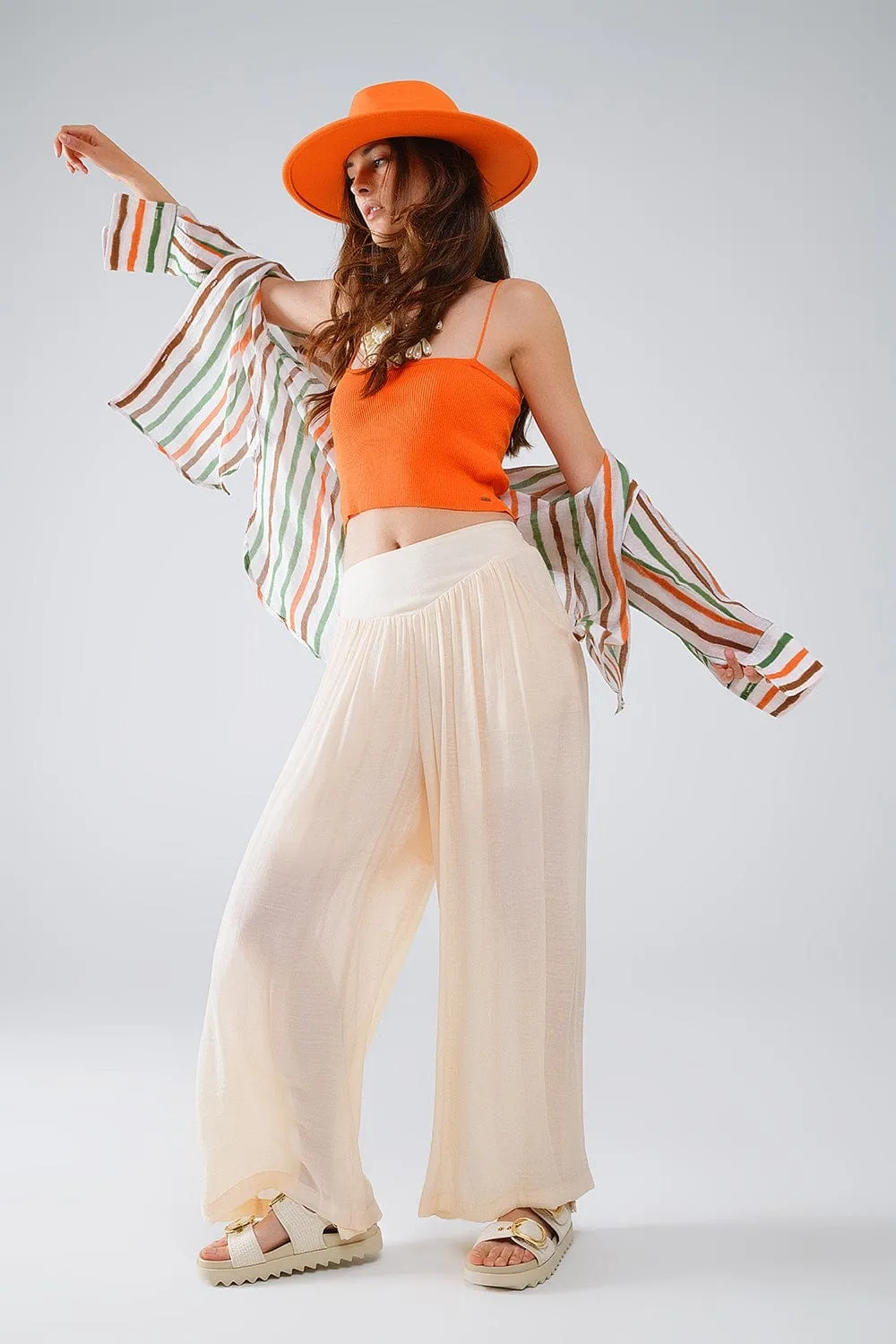 Beige Palazzo Style Pants With Side Pockets And Thick Waist Band