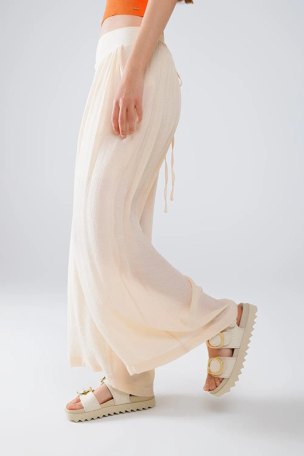 Beige Palazzo Style Pants With Side Pockets And Thick Waist Band
