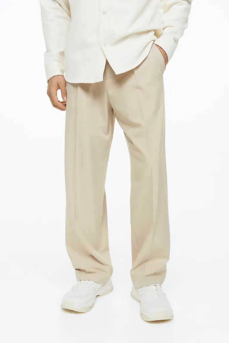 Elegant H&M loose fit trousers, light beige
