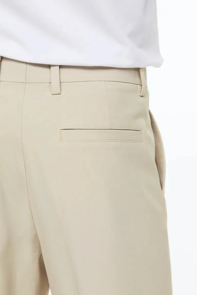 Elegant H&M loose fit trousers, light beige