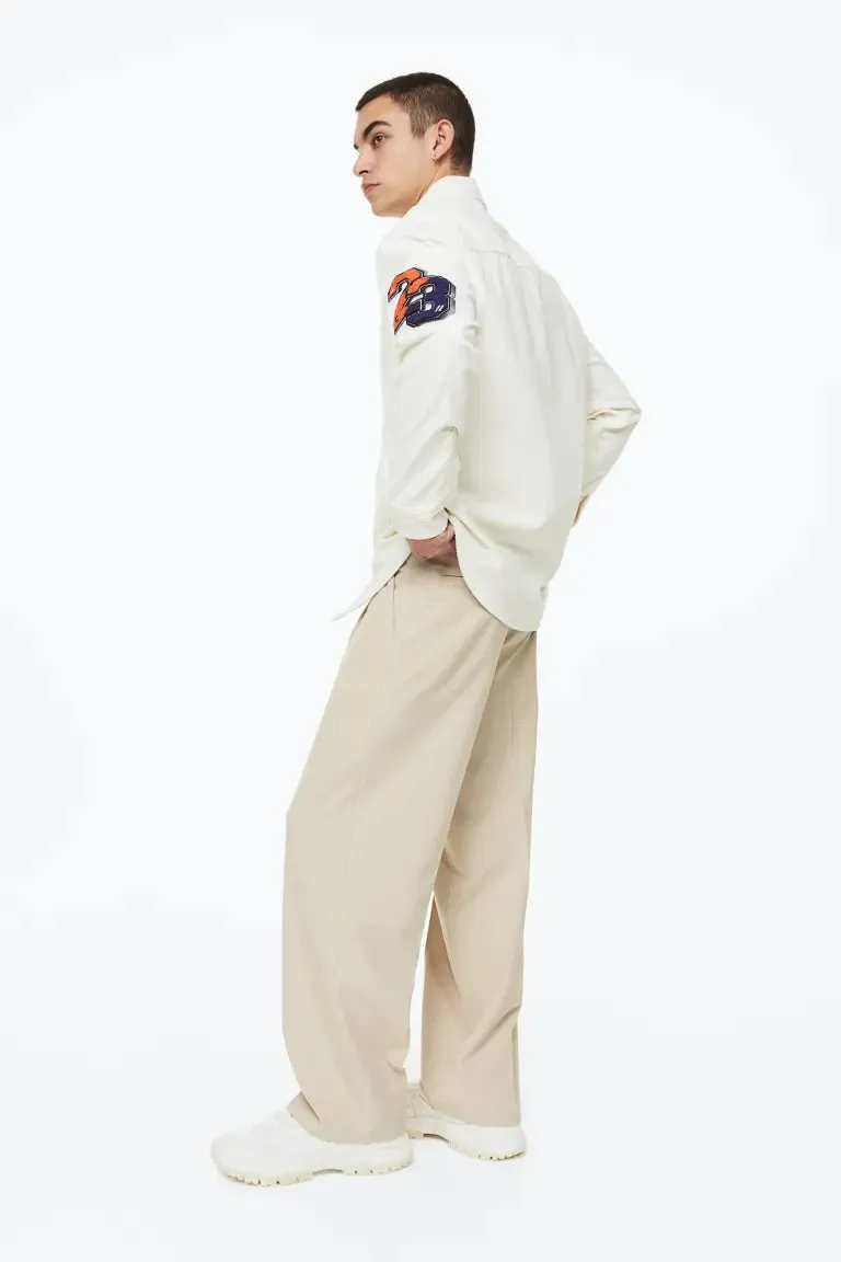 Elegant H&M loose fit trousers, light beige